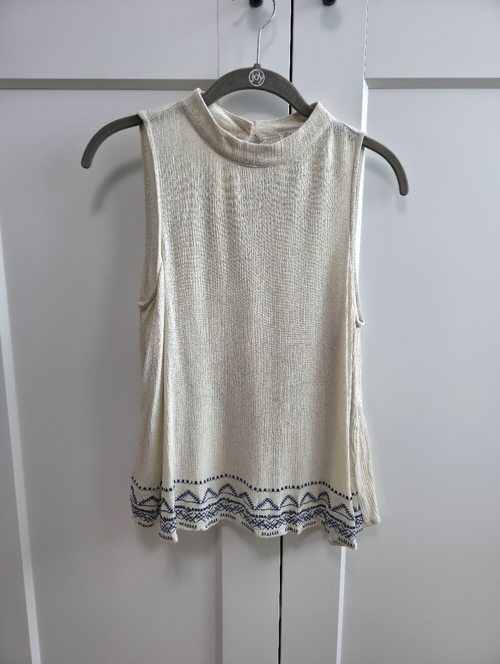 Love Fire Sleeveless Off-White Top